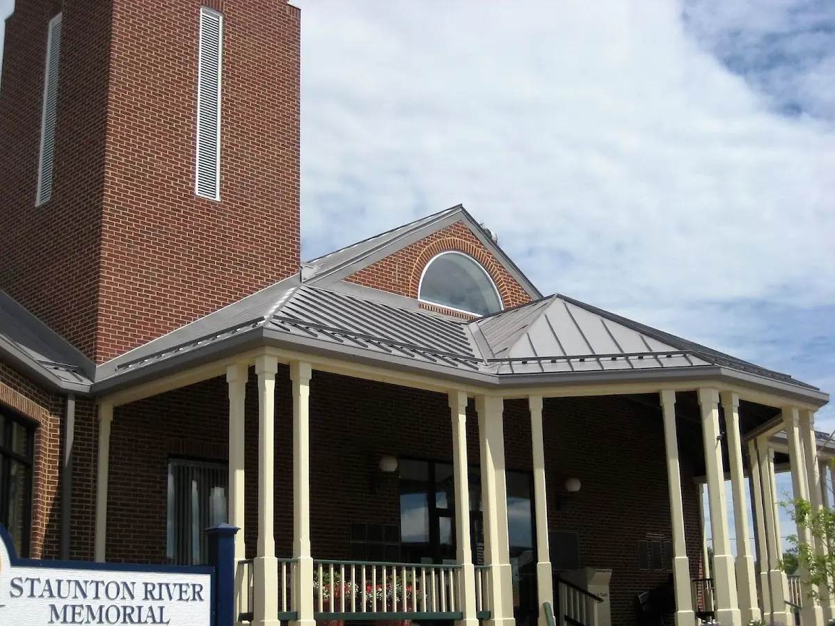 Skilled roofing craftsmen working on a residential roof in Kiley